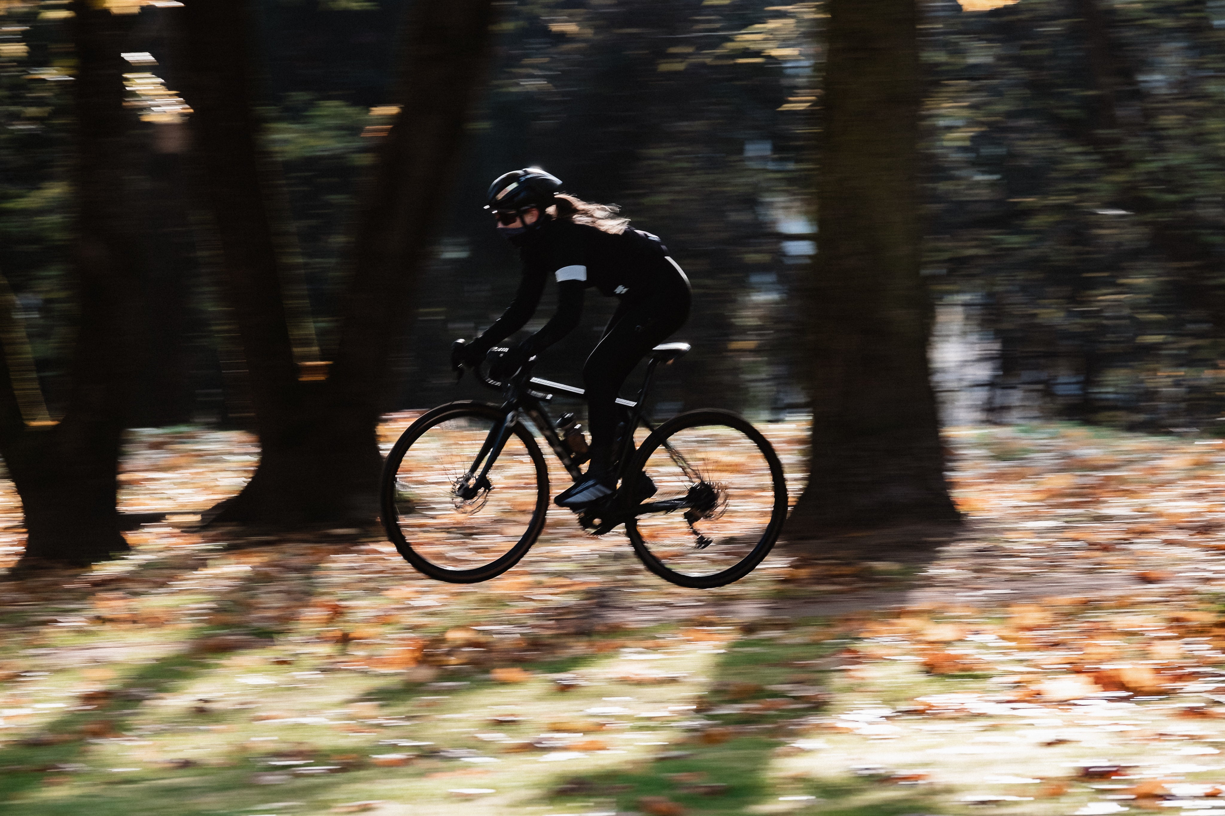 girl riding a gravel bike